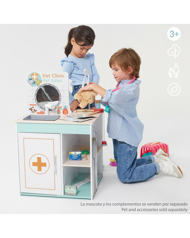 Teamson Vet Clinic educational toy set featuring pretend veterinarian tools and animal figures for imaginative play.