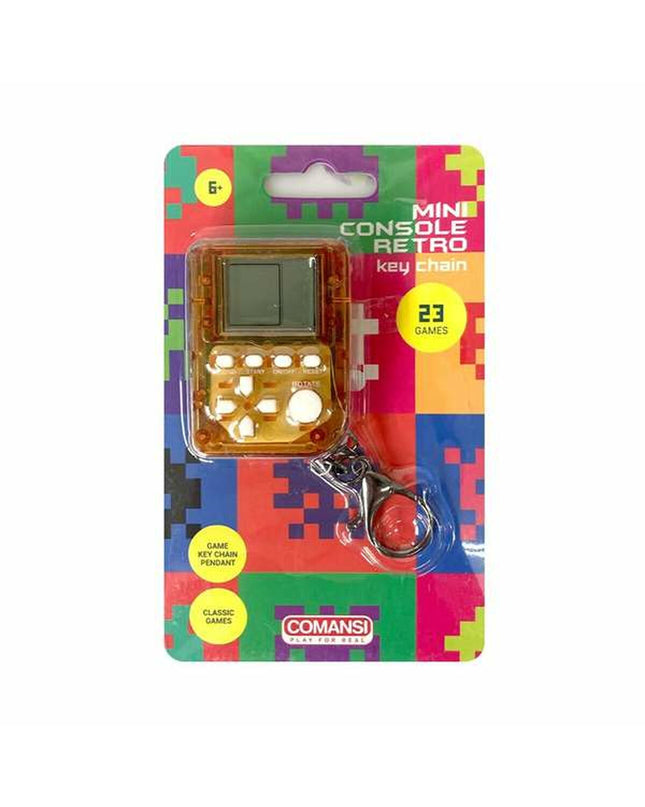 Portable Comansi handheld game console showing colorful game screen and controls, electronic toy for kids and gaming enthusiasts.