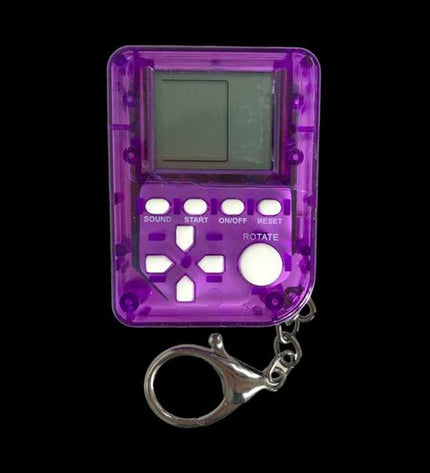 Portable Comansi gaming console toy, electronic handheld device with colorful buttons and screen for kids' entertainment.