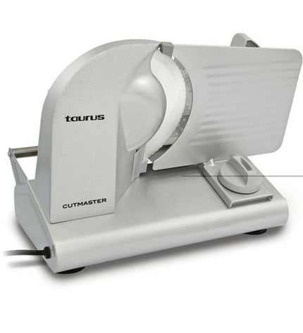 Taurus Cutmaster 150 W slicing machine with stainless steel blade and compact design for kitchen use.