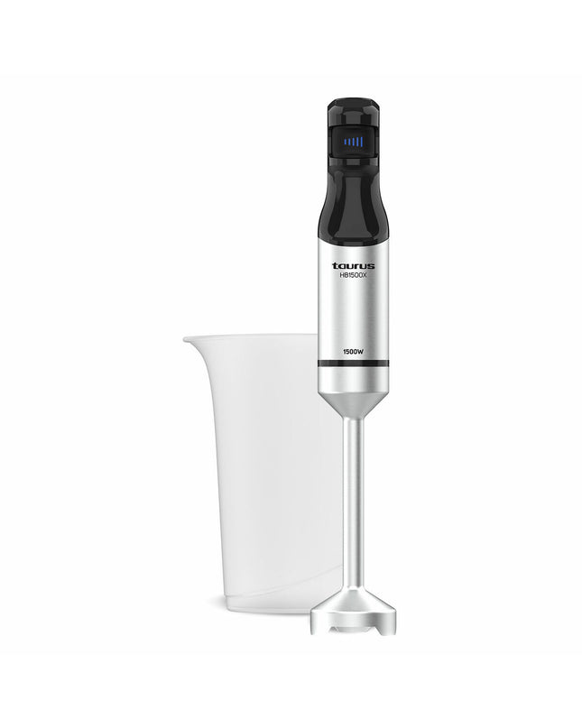 Taurus HB1500WX black hand blender with 1500W power, shown standing upright with blending attachment in a kitchen setting.