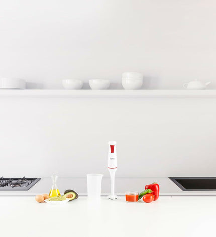 Taurus ROBOT750 hand blender with 750W power, featuring a sleek white design for cooking and kitchen tasks.