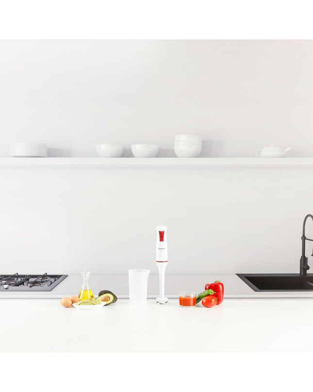 Taurus ROBOT750 hand blender with 750W power, featuring a sleek white design for cooking and kitchen tasks.