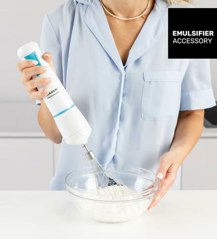 Taurus Robot 1000 Plux hand blender with stainless steel blending shaft and control buttons, designed for home cooking.