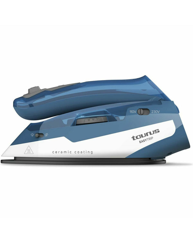 Taurus EASY TRIP 1000W steam iron with cord, compact design, and water tank for efficient household clothing ironing.