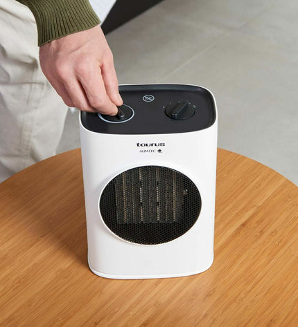 Taurus TROPICANO 7CR white portable heater with 1500W power, compact design for home heating and cooling.