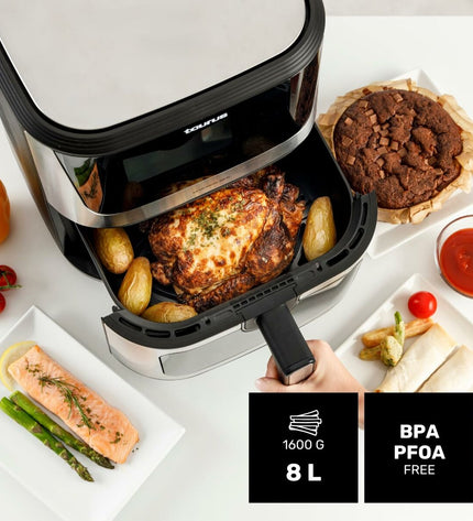 Taurus black 2100W air fryer with 8L capacity, compact electric kitchen appliance for healthy frying and cooking.