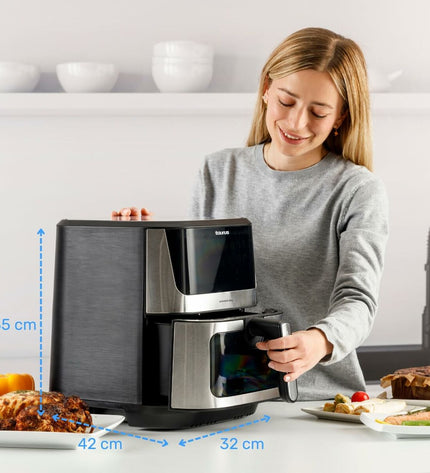 Black Taurus air fryer with 8-liter capacity and 2100W power, compact electric kitchen appliance for healthy frying.