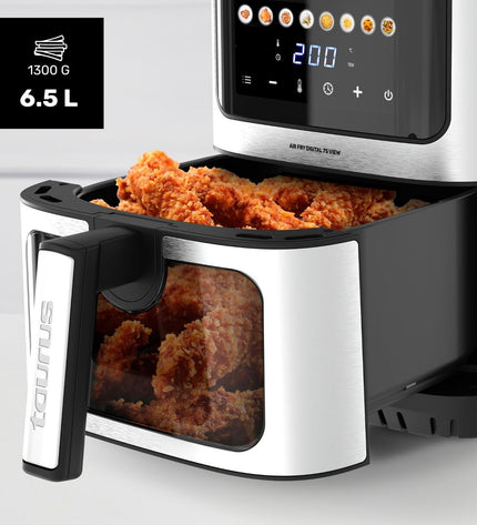 Black Taurus luchtfriteuse for home cooking, compact electric appliance with digital controls and air frying basket.