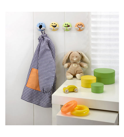 Pink Inofix hook for hanging, designed for children's towels in bathroom and kitchen, with a simple mounting design.