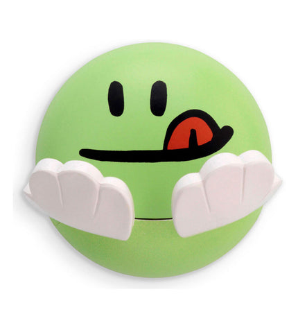 Inofix green towel hook for children, wall-mounted bathroom accessory for hanging hand towels, in a bathroom setting.