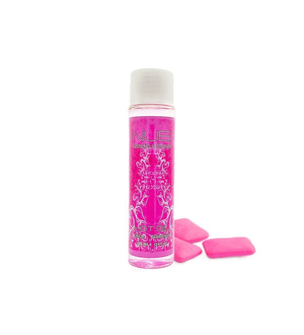Nuei Cosmetics of the Night massage oil bottle for health and personal care, with a close-up of the product label and packaging.