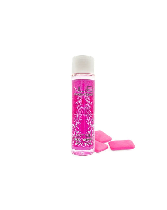 Nuei Cosmetics of the Night massage oil bottle for health and personal care, with a close-up of the product label and packaging.