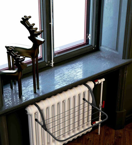 JATA Waslijn for household laundry drying, featuring durable cords and hooks for efficient clothes hanging and organization.