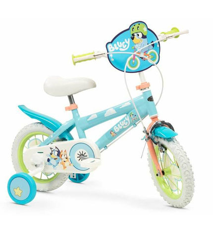 Bluey 12-inch children's bike in blue and green, designed for sport and outdoor riding, featuring a sturdy frame and colorful details.