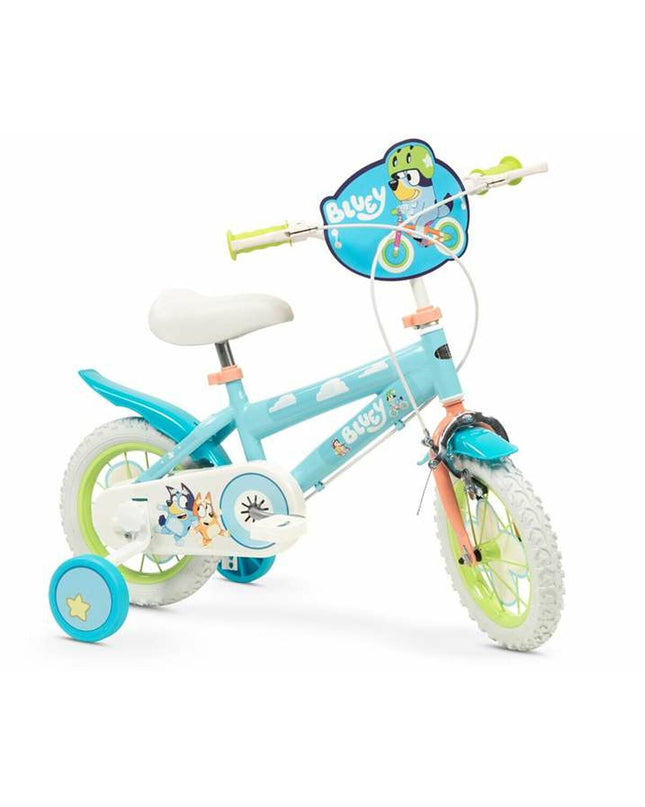 Bluey 12-inch children's bike in blue and green, designed for sport and outdoor riding, featuring a sturdy frame and colorful details.