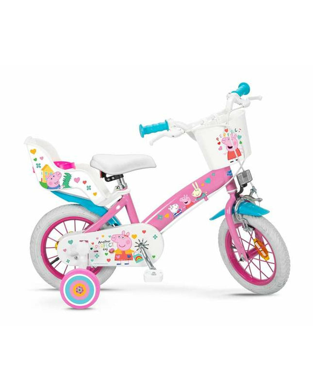 Pink Peppa Pig 12-inch children's bicycle, sporty outdoor bike for kids featuring Peppa Pig design and durable frame.