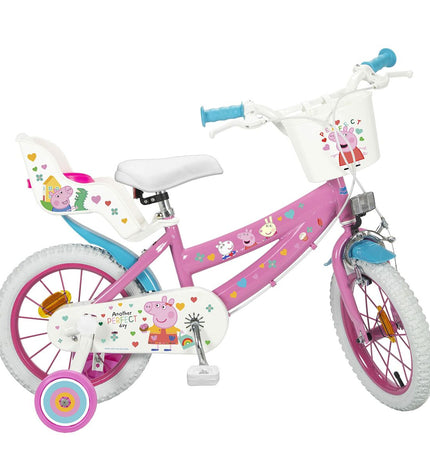 Pink Peppa Pig 14-inch kids' bicycle for outdoor riding, featuring colorful Peppa Pig design and sturdy frame suitable for children.