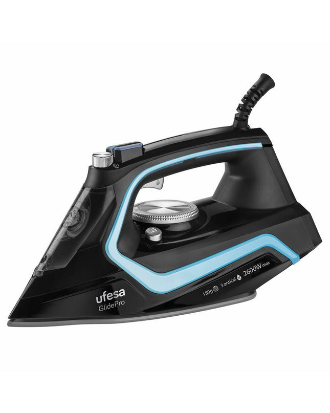 UFESA PV2600 steam iron with 2600W power and 220V, featuring a sleek design for efficient home ironing.