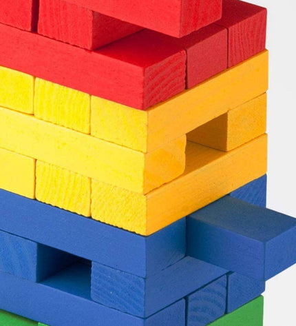 Cayro Block & Block board game with colorful building blocks and game pieces on a wooden surface.