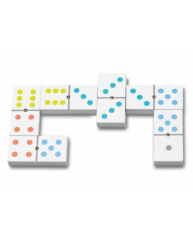 Cayro Domino set featuring rectangular white tiles with black dots, arranged in a line on a wooden surface.