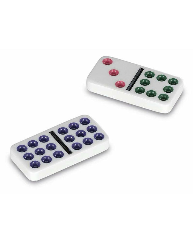 Cayro Domino set with rectangular black and white tiles arranged on a flat surface for family game play