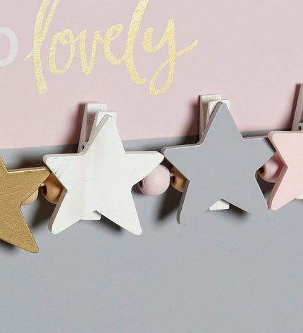 Decorative photo frame with star accents by DKD Home Decor, made of MDF and wood, measuring 40 x 1 x 24 cm.