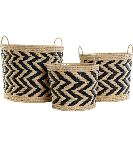 Set of three DKD Home Decor baskets in black, light brown, and natural fiber for home organization and storage.