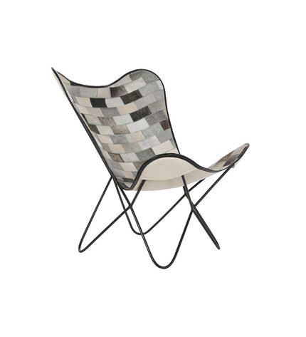 DKD Home Decor kitchen chair with white, black, beige, and gray upholstery, measuring 74x70x90 cm, in a modern home interior.