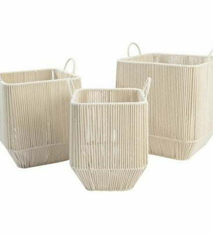 Set of three beige metal baskets by DKD Home Decor for home organization and storage, shown stacked with handles visible.
