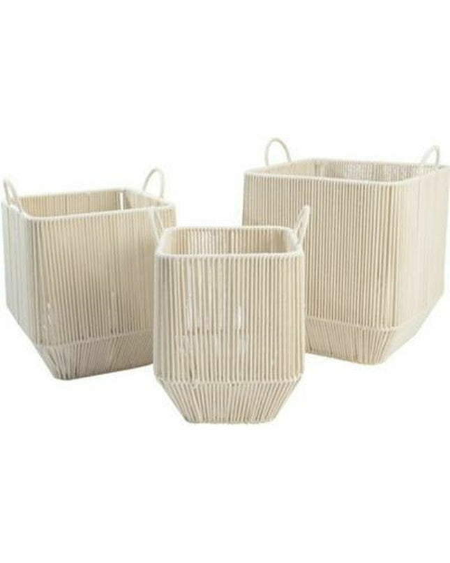 Set of three beige metal baskets by DKD Home Decor for home organization and storage, shown stacked with handles visible.