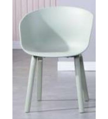 Green DKD Home Decor armchair with armleuning, measuring 56x58x78 cm, in a cozy home and kitchen setting.