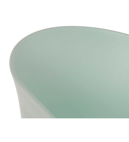 Green DKD Home Decor armchair with armrests, measuring 56 x 58 x 78 cm, in a cozy living room setting.