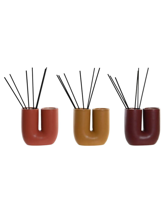 Set of three DKD Home Decor 100 ml city-themed vase air fresheners for home decor and kitchen use.