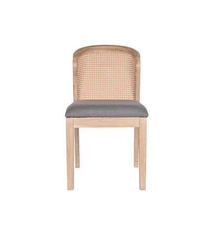 Dark gray DKD Home Decor kitchen chair with polyester upholstery, measuring 46x61x86 cm, in a modern home dining setting.