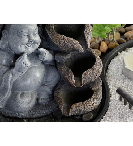 Two DKD Home Decor outdoor Buddha fountain statues, 29x21x23 cm, designed for garden decoration with oriental style.