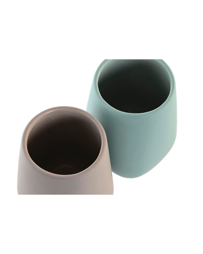 Set of two DKD Home Decor toothbrush holders in green and beige dolomite, 8x8x11 cm, for bathroom organization.
