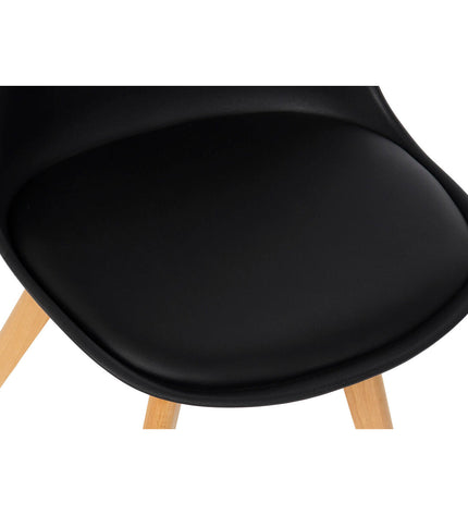 Black DKD Home Decor chair with dimensions 48x55x83 cm, suitable for home and kitchen furniture, shown in a modern interior setting.