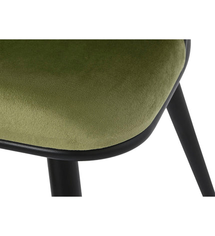 Black and green velvet DKD Home Decor chair with metal legs, measuring 66x60x84 cm, in a stylish home and kitchen setting.