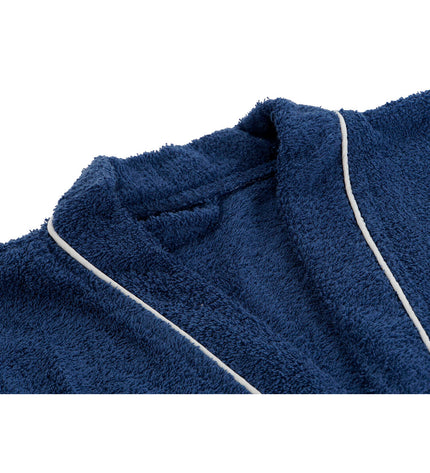 Home ESPRIT blue women's bathrobe, cozy house and cooking home wear, soft fabric with a relaxed fit, shown hanging on a hook.