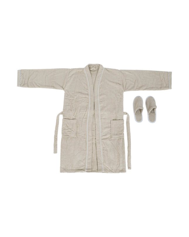 Beige Home ESPRIT bathrobe for women made of 400 g/m² terry cloth, shown hanging in a bathroom setting.