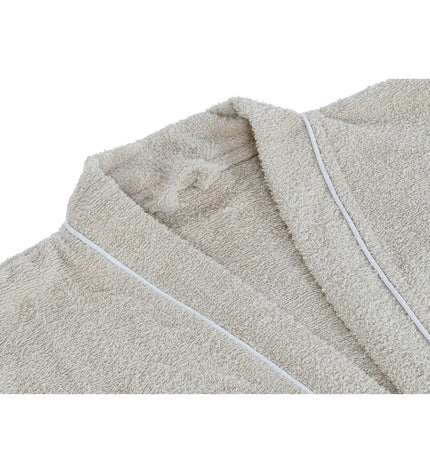 Beige home ESPRIT bathrobe for women, made of 400 g/m² soft fabric, shown hanging on a hook in a bathroom setting.