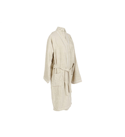 Beige Home ESPRIT bathrobe for women, made of 400 g/m² terry fabric, displayed on a hanger in a bathroom setting.