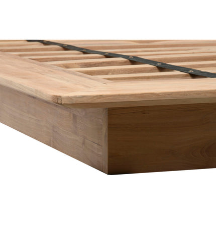Home ESPRIT bed frame, 180x200 cm, with a wooden headboard and sleek design, in a modern bedroom setting.