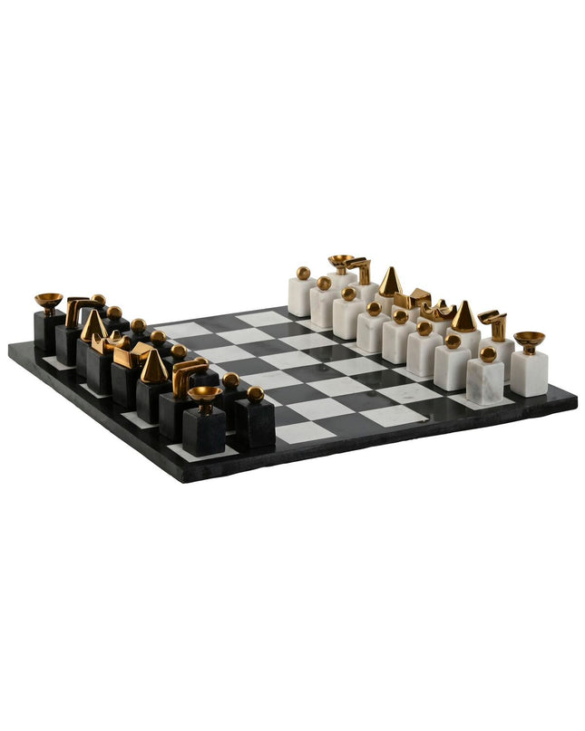 Home ESPRIT chess set with a steel and granite design, featuring intricately carved chess pieces on a matching board.