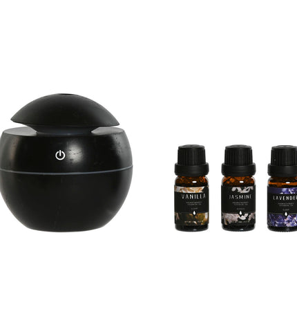 Home ESPRIT 10 ml essential oil diffuser with four parts, designed for home aromatherapy and decorative use.