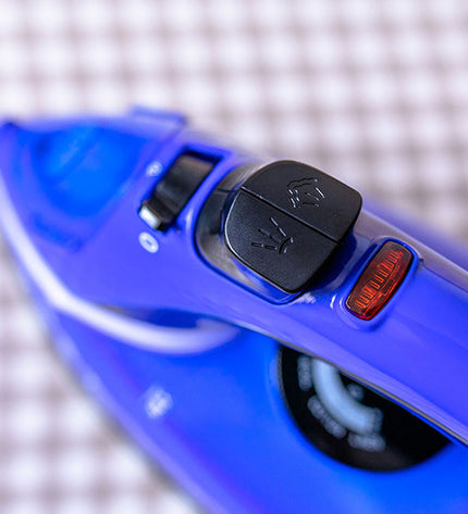 EDM Product steam iron EDM 07713 with 2000W power, compact size, featuring a sleek design for household garment ironing.