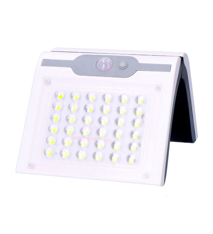 EDM LED outdoor garden light with motion sensor, 2W, 220 lumens, white finish, suitable for exterior decorative lighting.