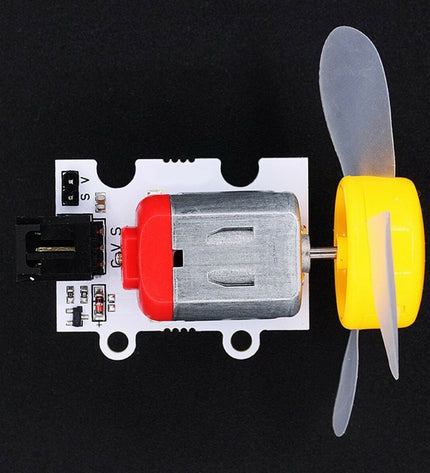 Ebotics DC motor for educational robot Ebotics, electronic toy and game, showing the small black motor with wires on a white background.