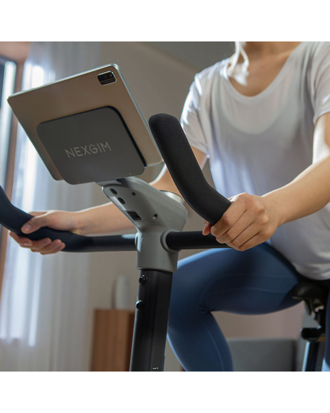 Refurbished Nexgim stationary exercise bike with Bluetooth 5.0, suitable for fitness and outdoor sports training.